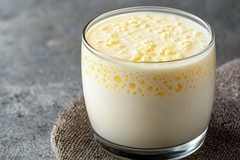 Image Glass of fermenting milk