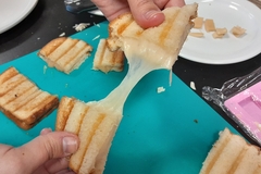 Image plant-based cheese stretching.