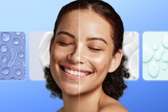 Image A woman smiling with one side of her face without retinol and the other side with.