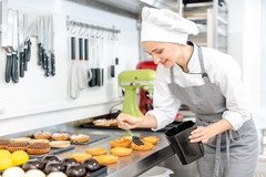 A chef making pastries.