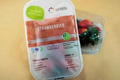Strawberries in plastic packaging.