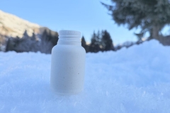Image NBCo bottle in snow at Davos