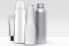Image Several white bottles and a silver container.