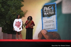 Image Woman on stage at the P&G event