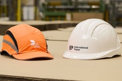 Image Construction helmets with International Paper and DS Smith logos.