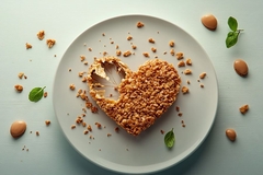 broken heart shaped fried chicken on plate