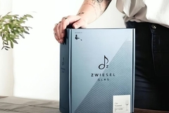 Image A person holding a box.