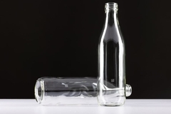 Image A close-up of two glass bottles.