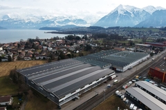 Image mountain range with Neopac facility in foreground