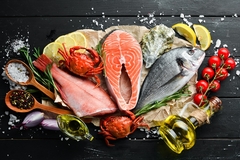 Image Seafood on a black wooden background