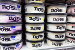 Noosa brand yogurt containers on supermarket dairy shelf