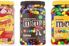 three plastic containers full of sweets
