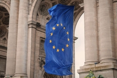Image European union flag hanging on old building