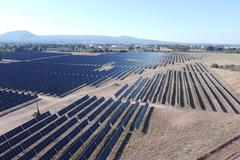 Land filled with solar panels.