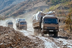 Image trucks carrying aid resouces