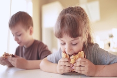 Children eating junk food.