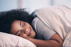 Image Woman sleeping peacefully with PeptiSleep