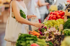 Person shopping for vegetables