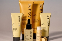 Image Skin care tubes and jars on display.