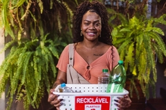 woman holding recycling box