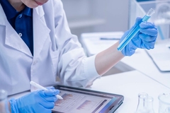 Image Laboratory analyst checking ingredient composition.