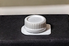 Image A white cap.