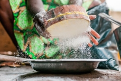 Image Person cooking with corn meal