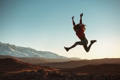 Image Woman jumping outside