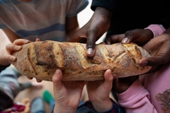Image children hold one piece of bread