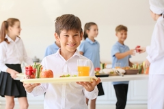 Image Boy with healthy school meal.