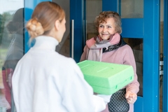 Image Senior woman receiving medically tailored meal