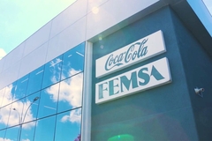 Image Building with Coca-Cola FEMSA logo.