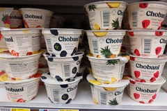 Image Chobani Greek Yogurt on sale in a supermarket refrigerator shelf