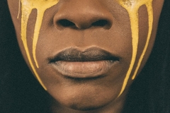 woman crying yellow tears