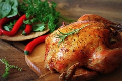 Image A cooked chicken.
