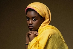 Image dark skin girl with yellow hijabi