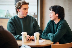 Image two people having coffee