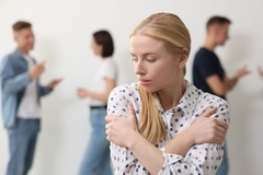 Image Afraid woman in a group of people