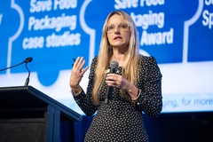 Image woman speaking at conference