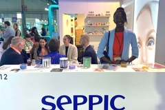 Women behind Seppic booth at Vitafoods