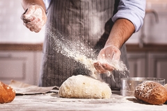 Baker making bread.