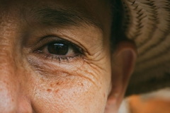 woman with eye wrinkles smiling