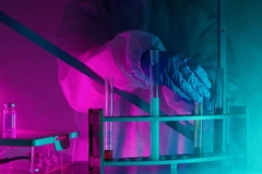 Image lab with test tubes and scientist
