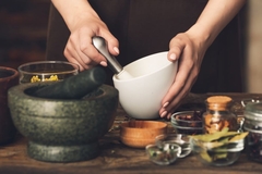 Image Person making herbal medicine