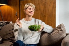 Image Woman eating salad