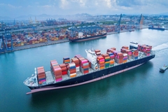 Image Aerial view of container cargo ships on the ocean.