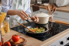 Image man pours oil when cooking