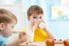 A child eating a school meal.