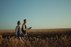 Image Farmers working in a field.