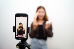 teenager giving beauty advice on TikTok GRWM tutorial